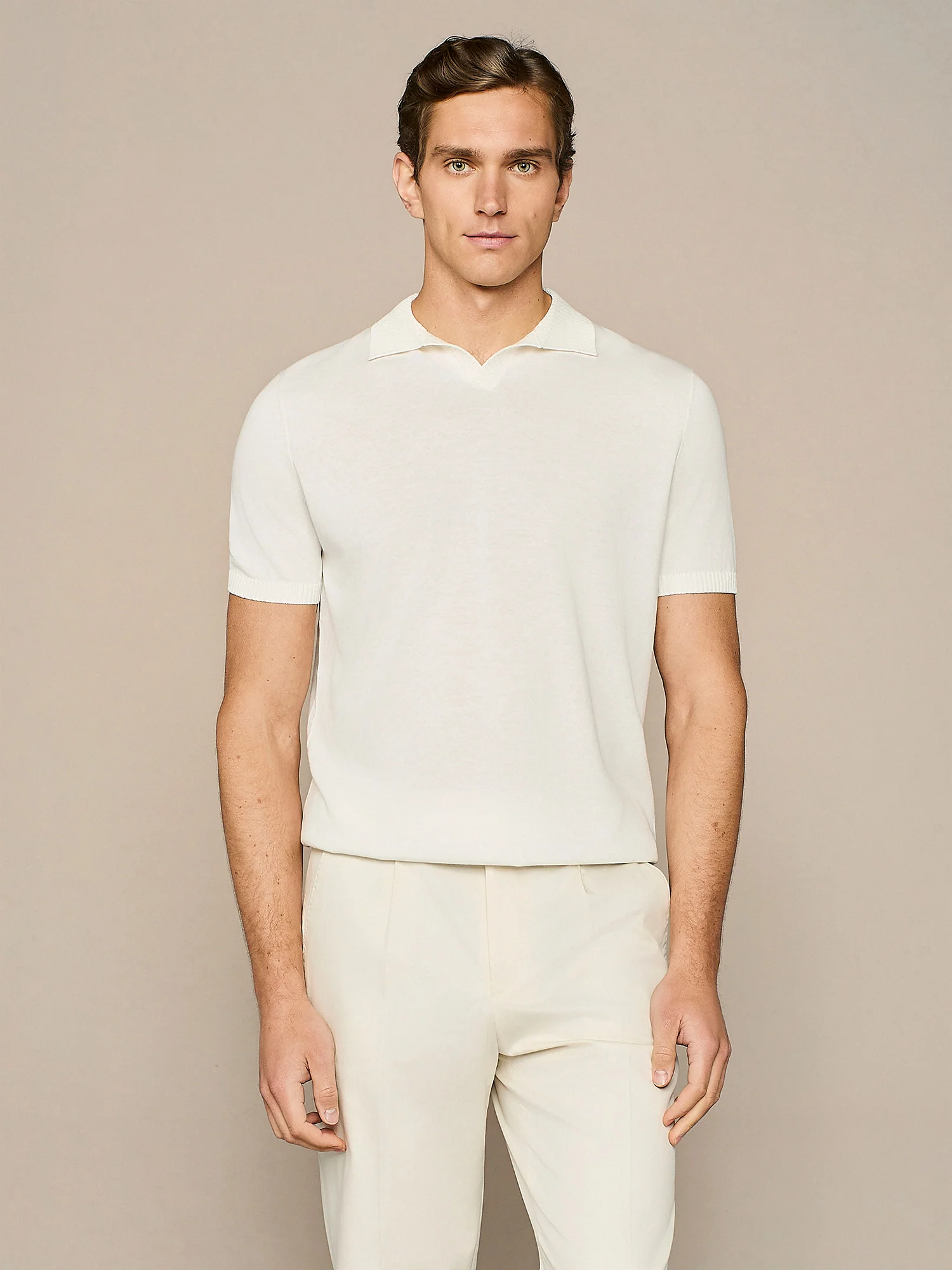 Polo crepe in maglia bianca