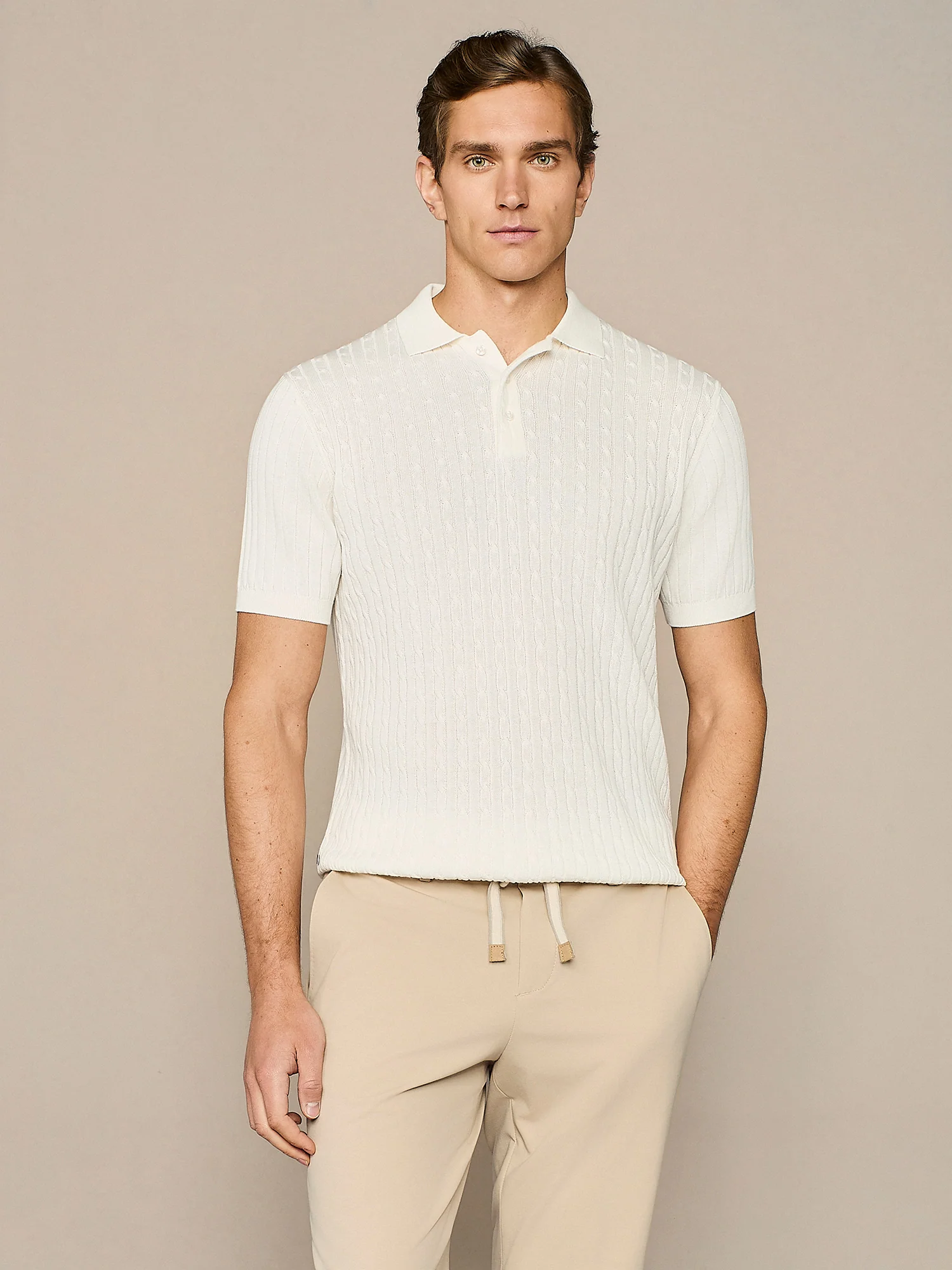 Polo trecce in maglia bianca